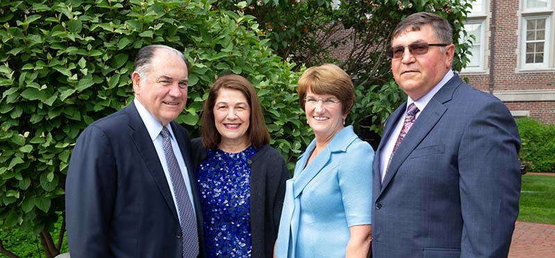 Kevin McCafferty and Leslie Ferrick McCafferty ‘76 (left) along with Chair of the Board of Trustees Margaret L. McKenna ’83 and her spouse Michael Mangaudis